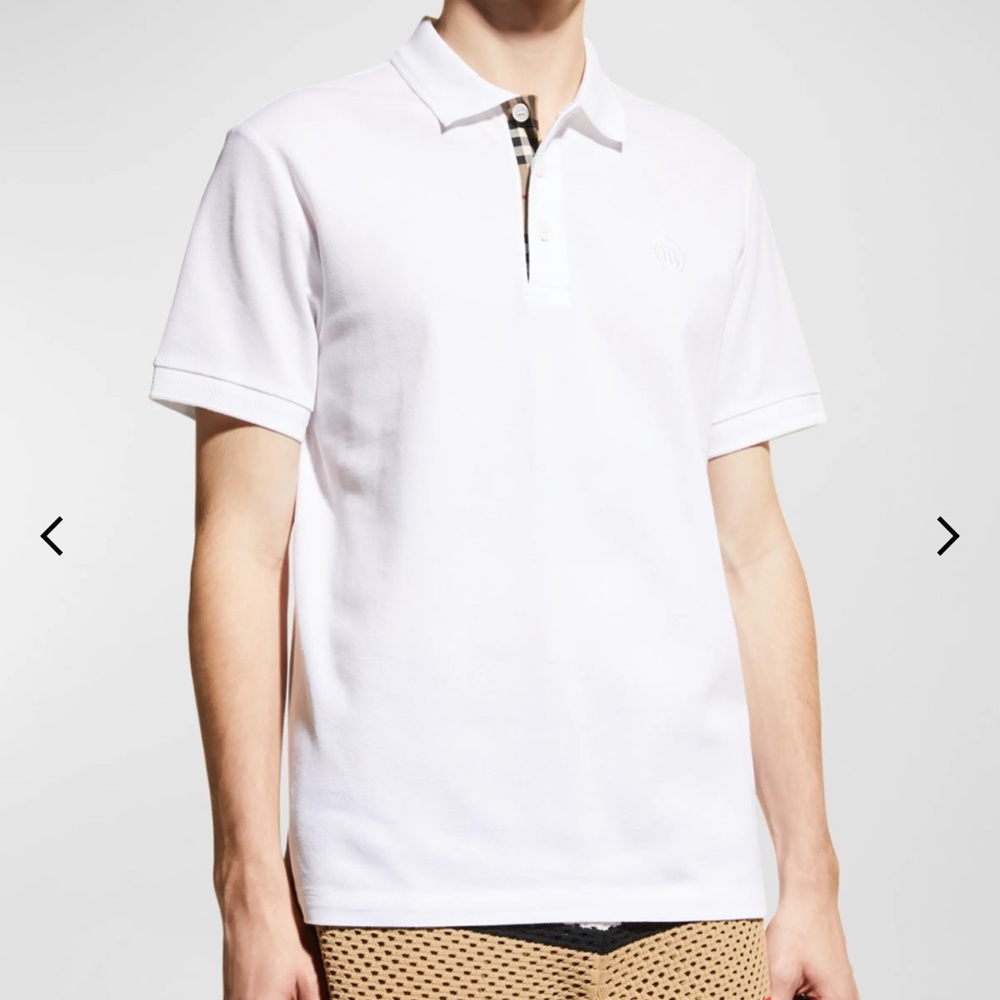 Burberry solid polo shirt with check lining at placket